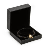 UNCOMMON Men's Beads Bracelet One Gold Jeweled Warrior Charm Black Lava Beads