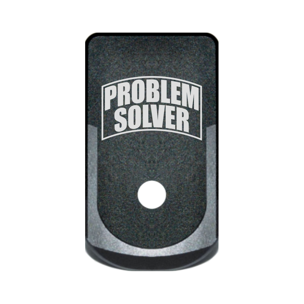 Problem Solver laser engraved on a magazine base plate grip extension for Glock 43