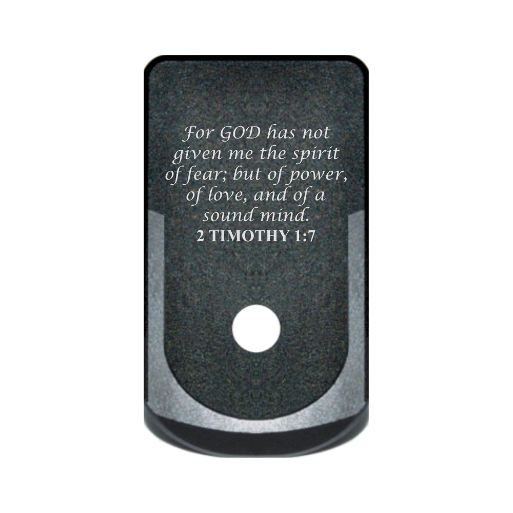 2 Timothy 1:7 laser engraved on a grip extended magazine base plate for Glock 43